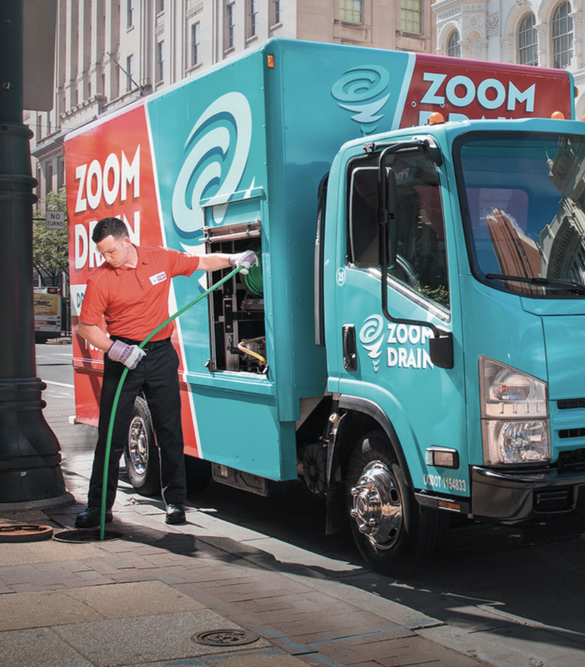 Zoom Drain employee working